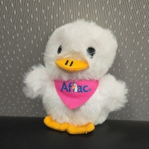 White and Yellow Plush Duck